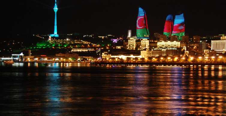 Baku skyline with Flame Towers and the Caspian Sea boulevard at blue hour